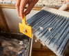 CleanTech™ Wall-Mounted Broom